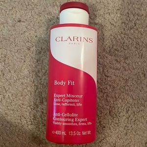 Clarins body fit more than half of a bottle left